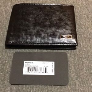 Black Tumi bi-fold wallet