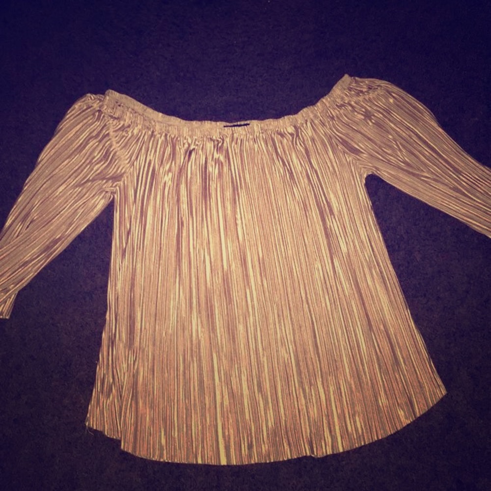 Over sized over the shoulder silky blouse