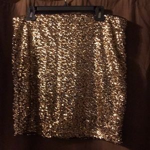 Get sexy in this Gold Sequin Mini skirt