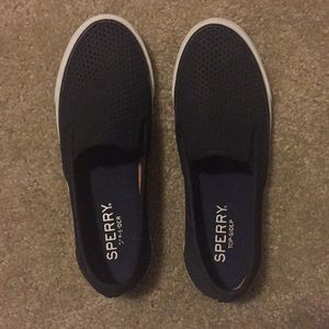 Black Sperry slip-ons