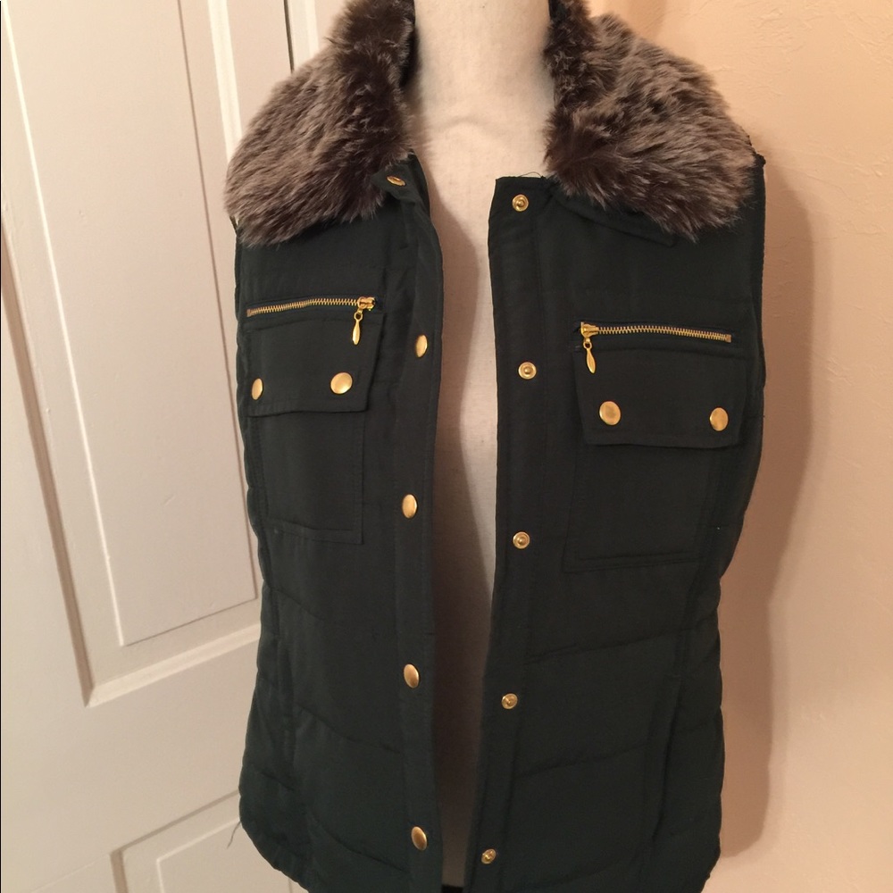 Dark green vest, worn twice