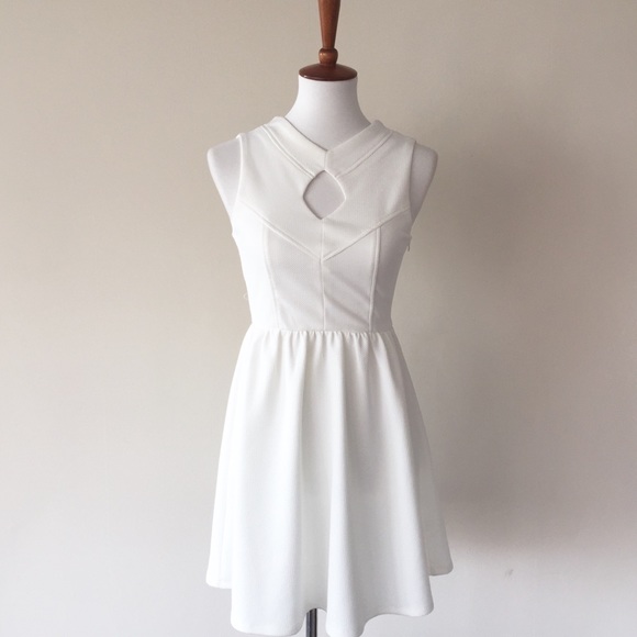 Fab 'Rik Dresses & Skirts - Fab 'Rik Boutique White Cutout Skater Mini Dress