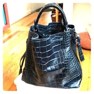 Super chic bucket bag in a lovely navy snakeskin!