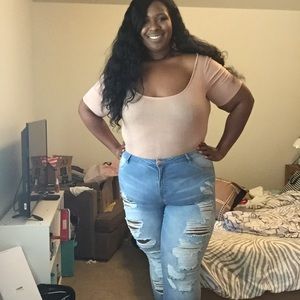 A plus size distressed jeans.