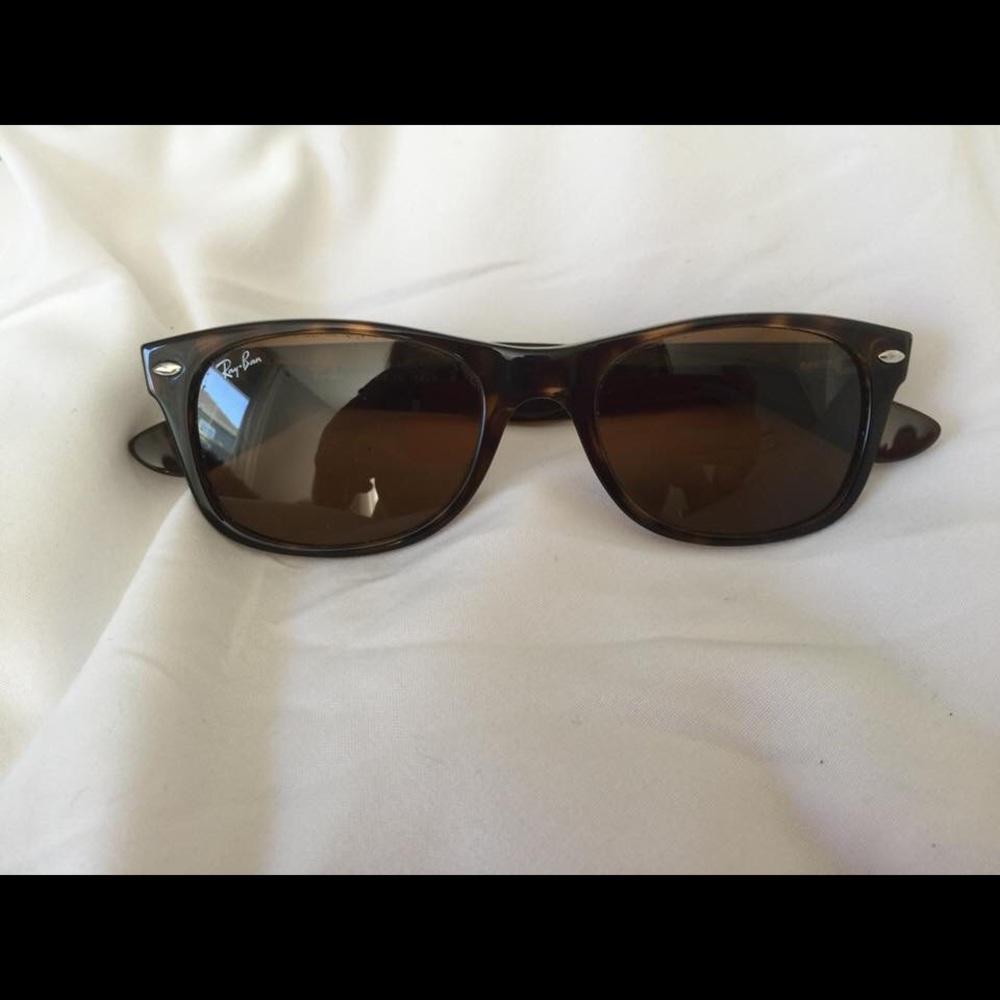 Ray Ban sunglasses.