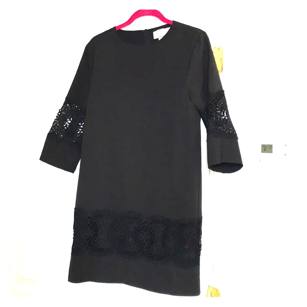 Beautifully chic black dress with lace detail!