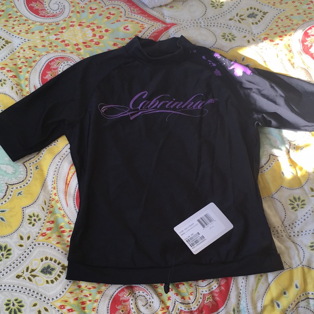 Cabrinha. New with tags. Women’s rash guard