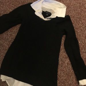 Black and white collared sweater.