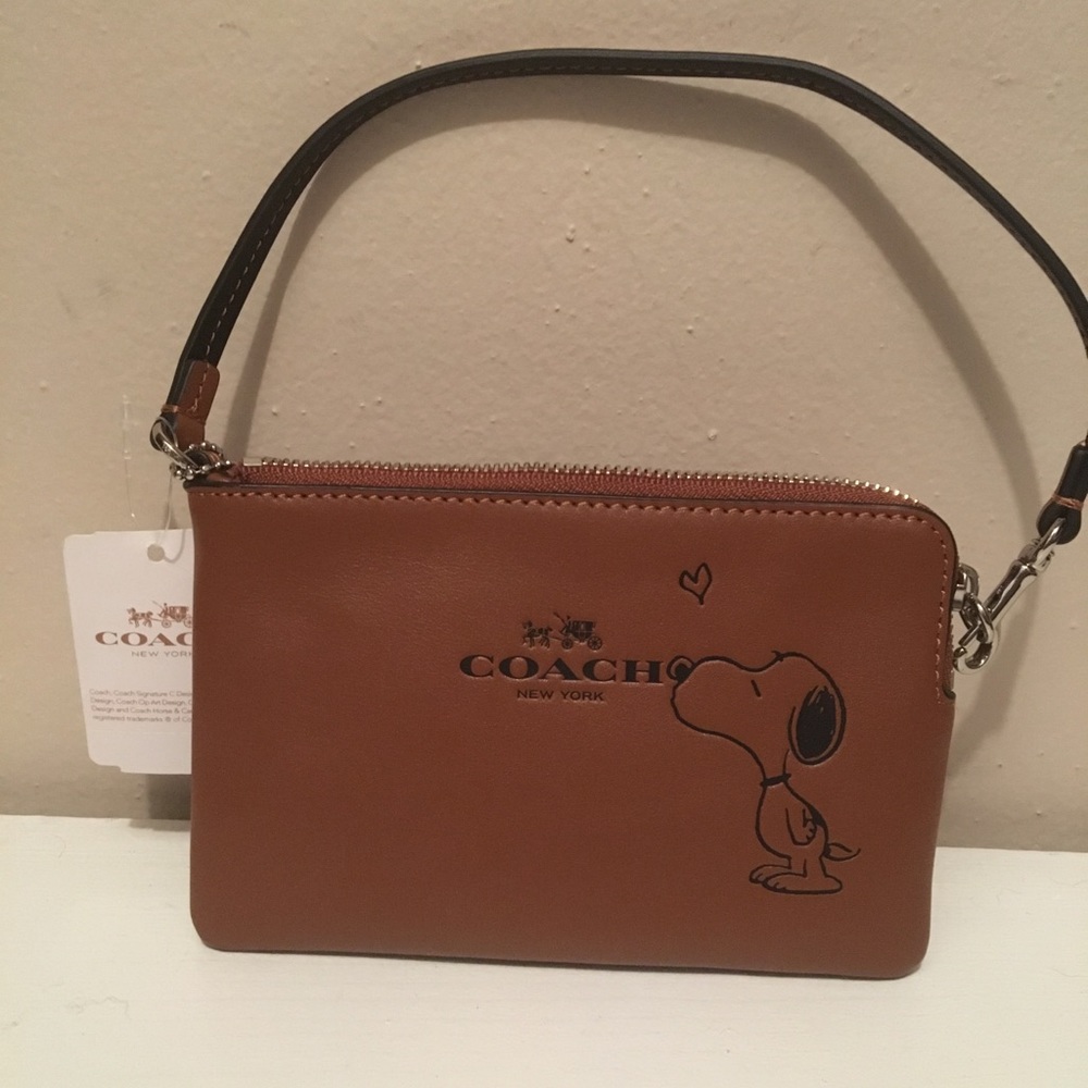Snoopy coach wristlet, brand new