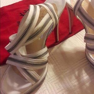 Christian Louboutin zip heels