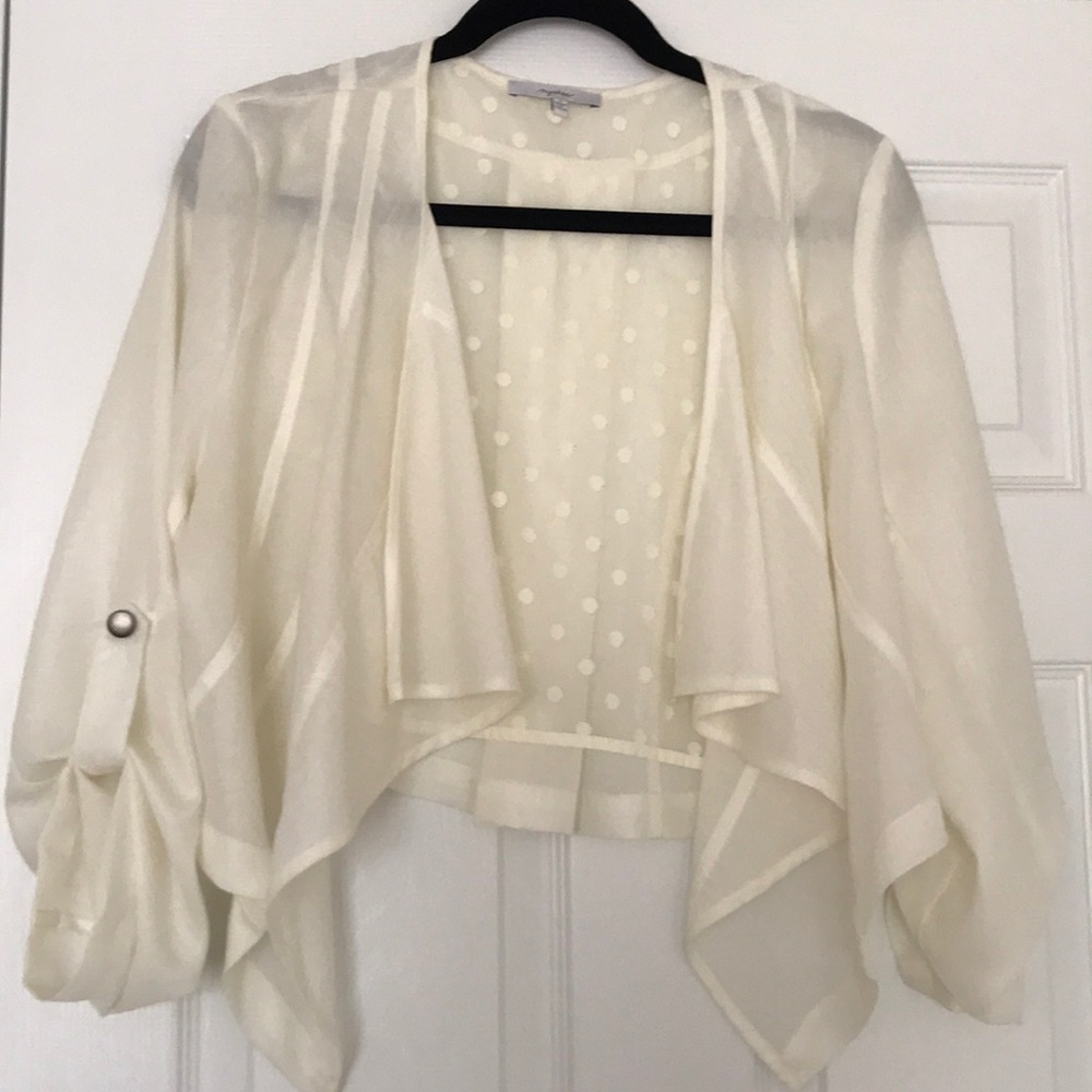 Cream jacket blouse.