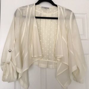 Cream jacket blouse.