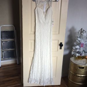 Ivory lace floor length dress.