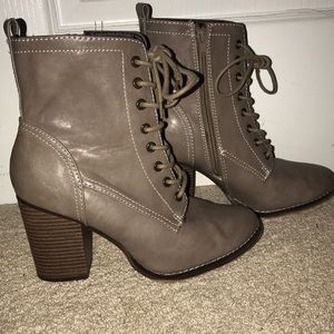 Tan heeled boots.