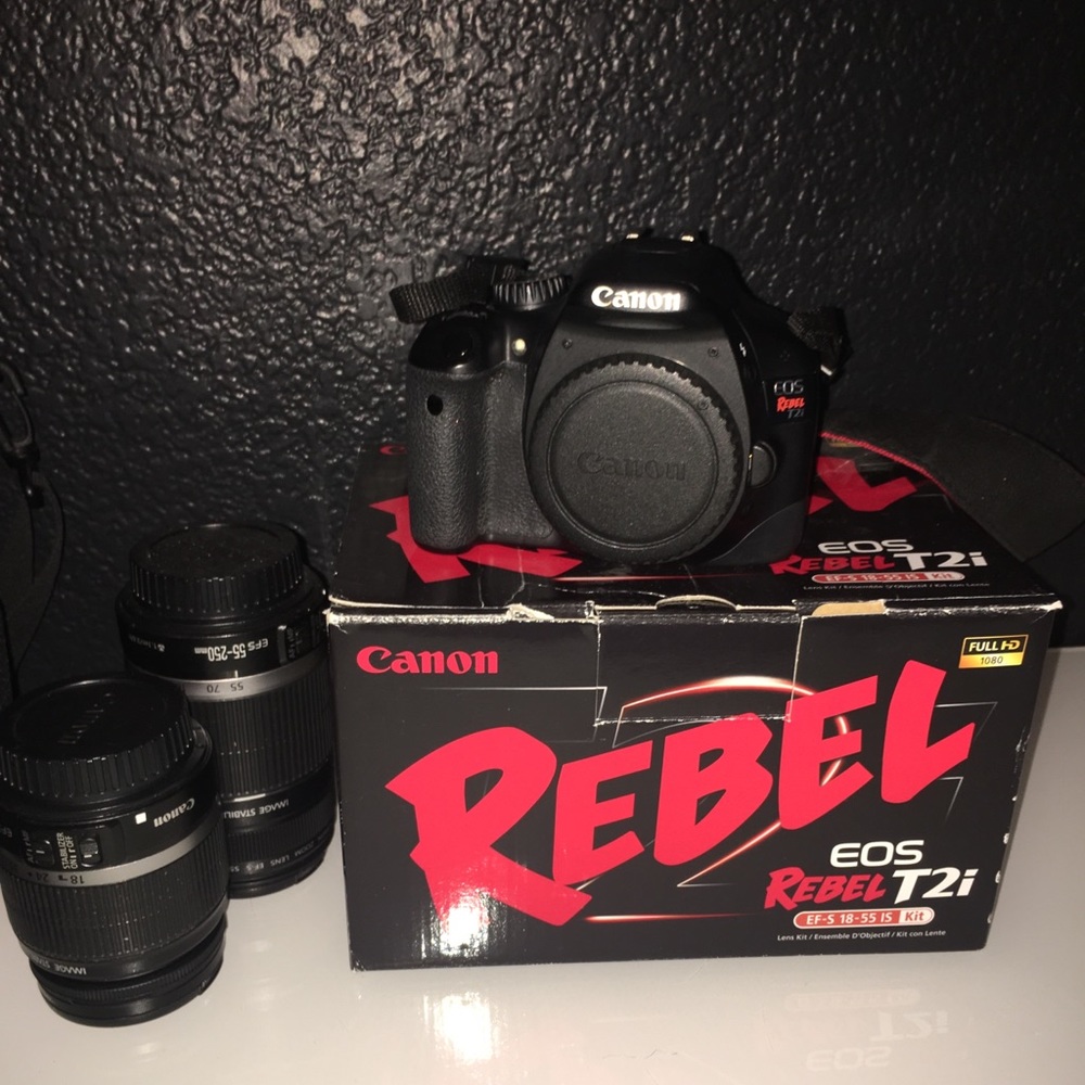 Canon rebel t2i with 2 lenses and a bag