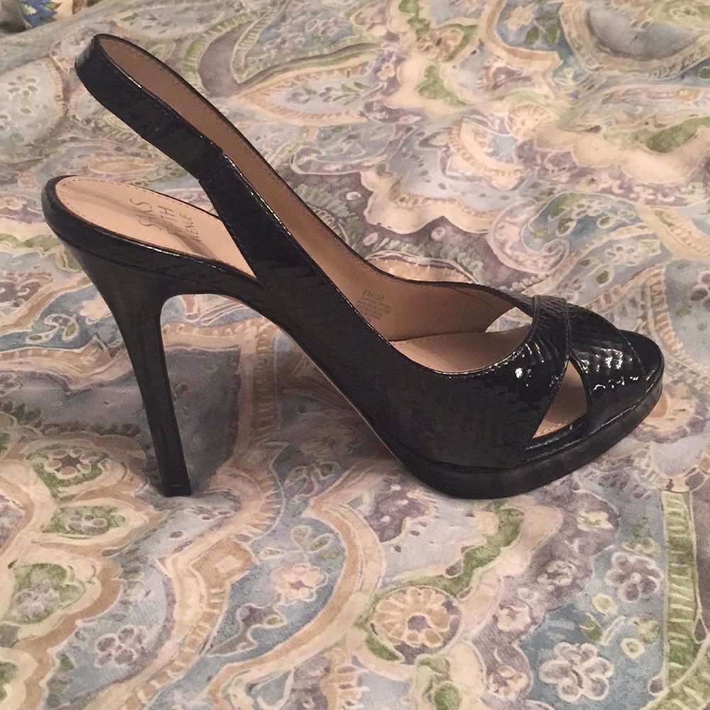 Black patent platform heels. Textured patent