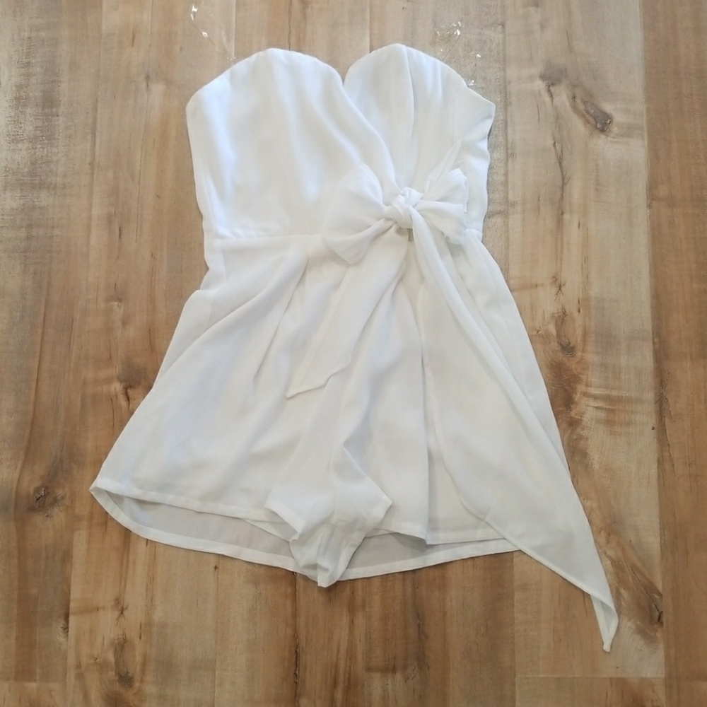 Strapless ivory bow romper