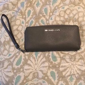 Michael Kors wrist bag or clutch.