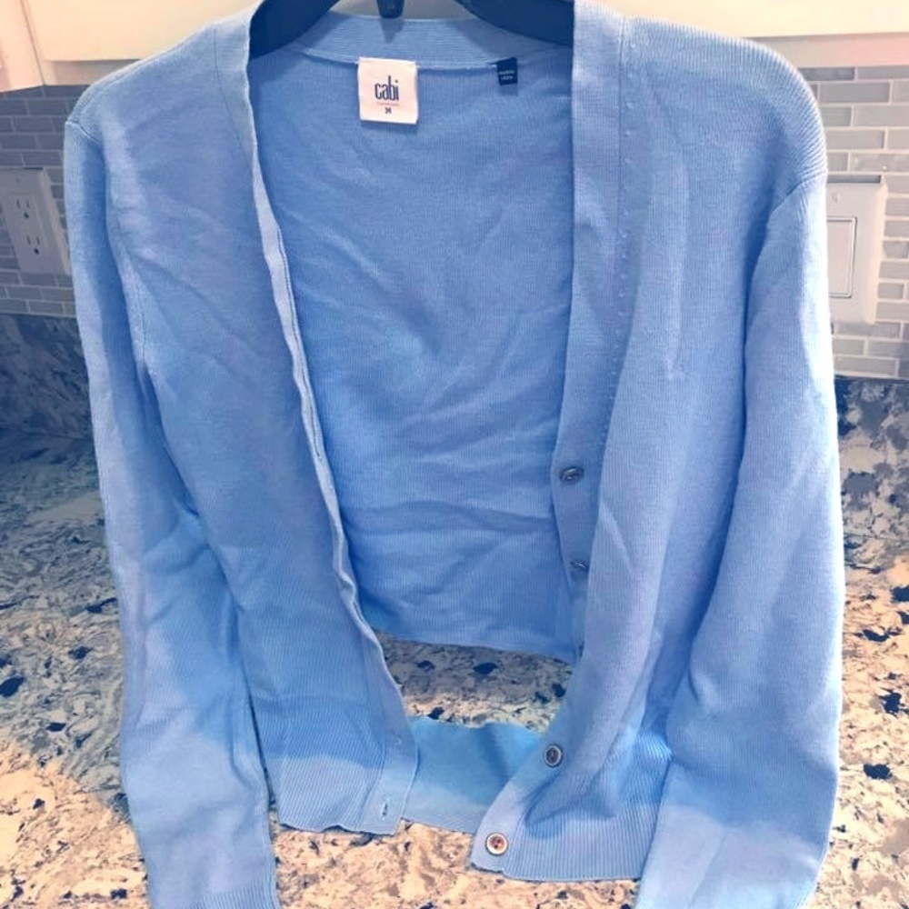 Cardigan sweater with cut out detail