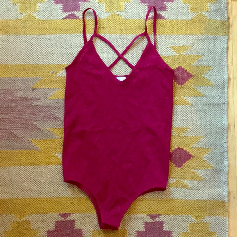 Onesie with cross straps