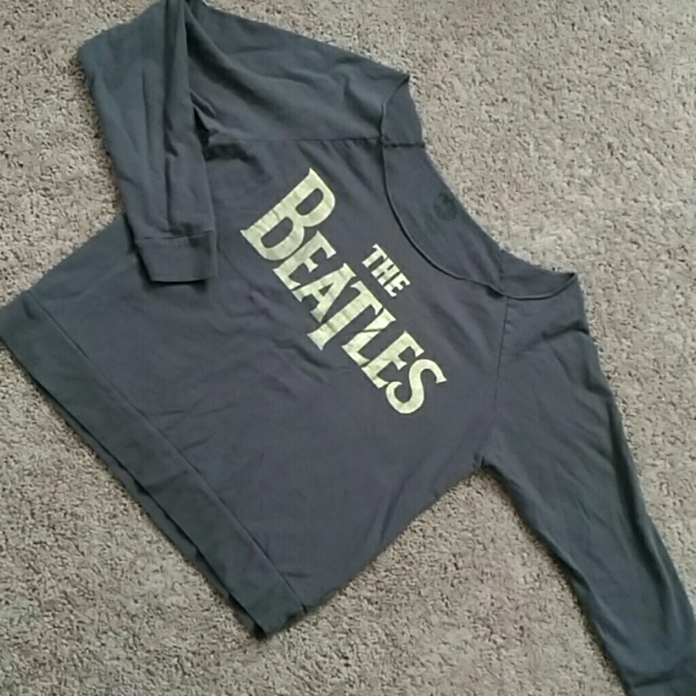 Beatles off the shoulder long sleeved shirt.