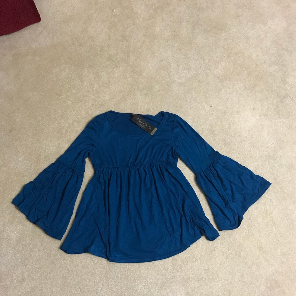 Bell sleeved teal shirt