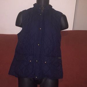 Polo vest 4pocket, button on side blue in color
