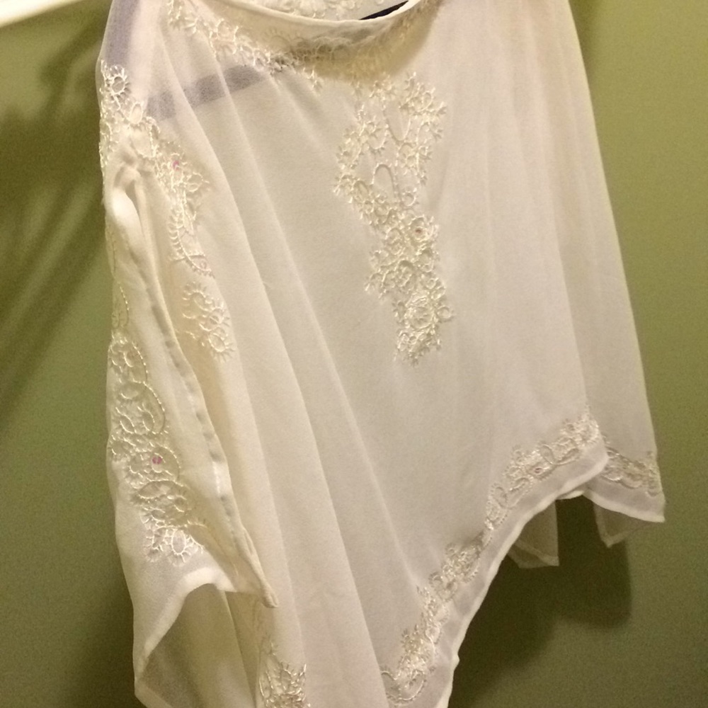 Sheer sequined over top, Cutaway sleeves.