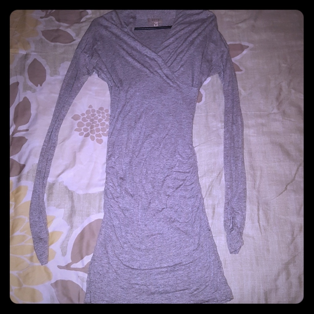 Gray long sleeve form fitting dress.
