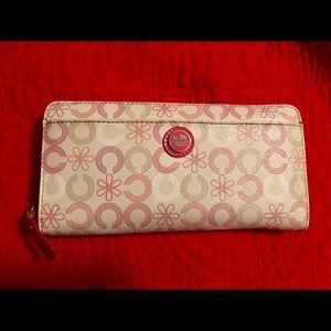 Authentic Coach Waverly Daisy accordion wallet.
