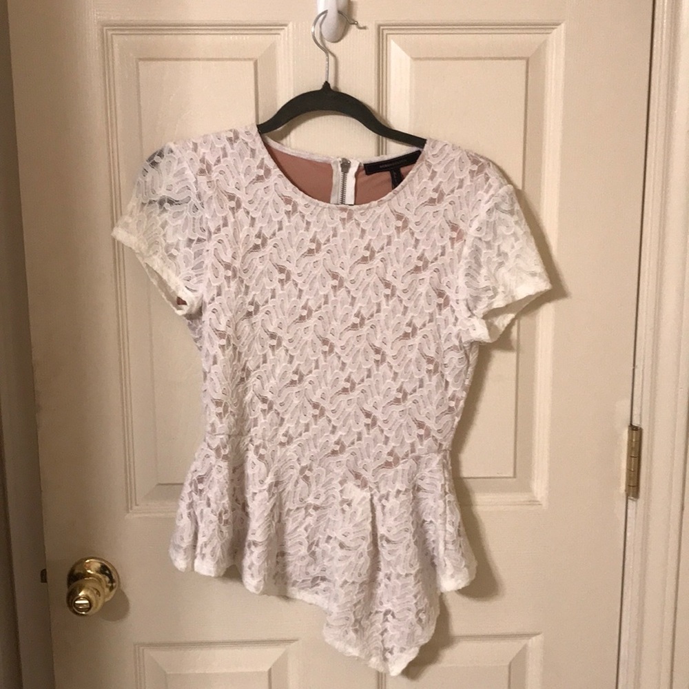 White asymmetrical peplum top