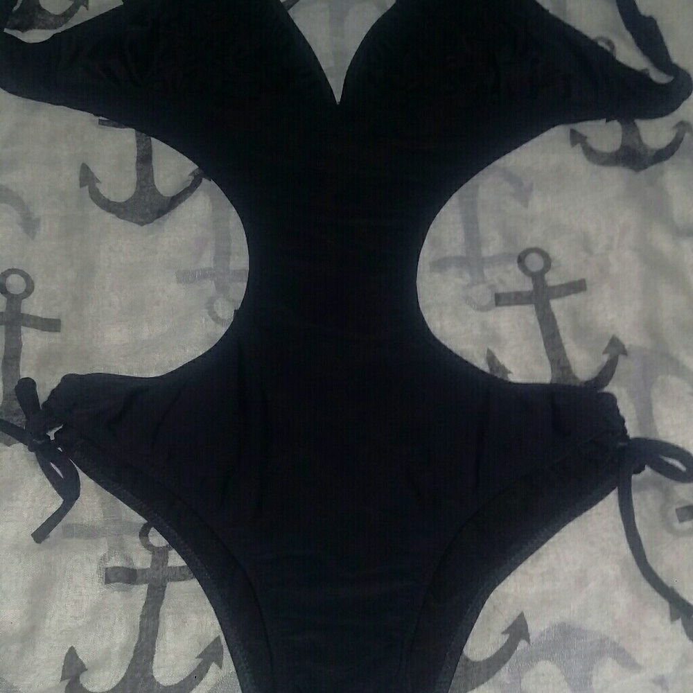 Tout one piece cutaway sexy swim suit.