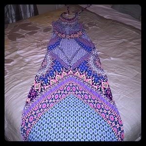 Long, multicolored maxi dress with cut outs.