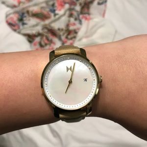 MVMT gold/pearl face women’s watch.