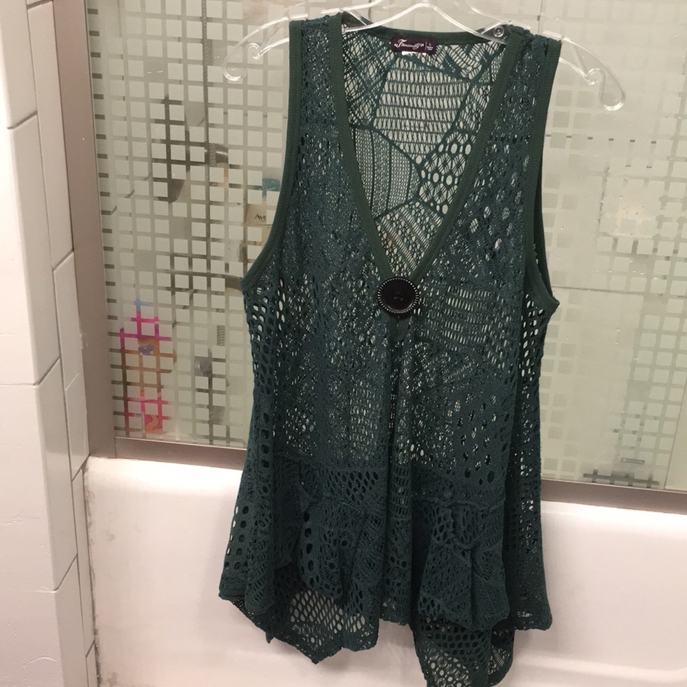 Long sleeveless tunic