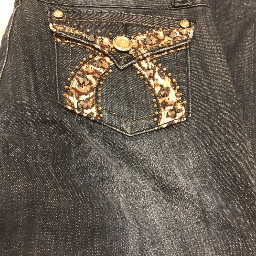 Jeans with leapord print bows on pockets