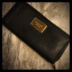 Trade- Michael Kors black and gold wallet