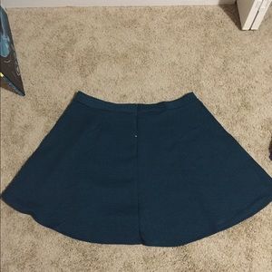 Teal mini skirt with design