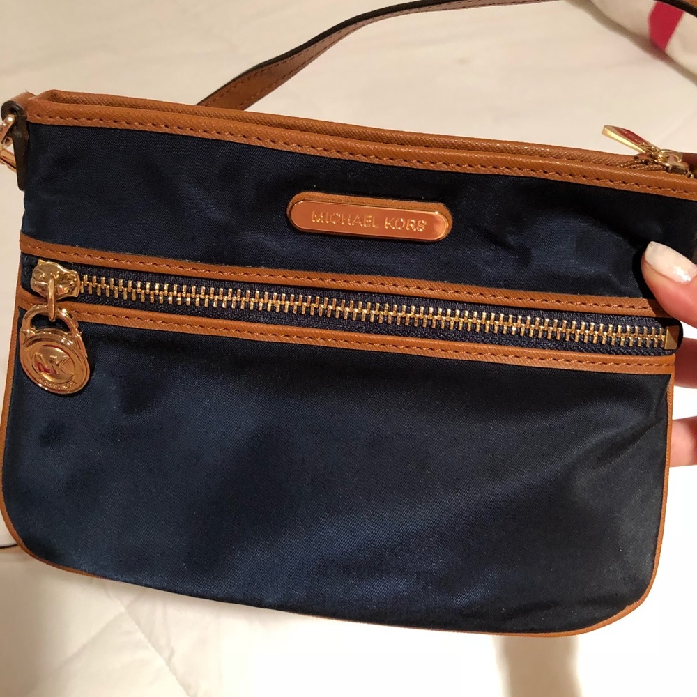 Small Michael Kors blue wristlet