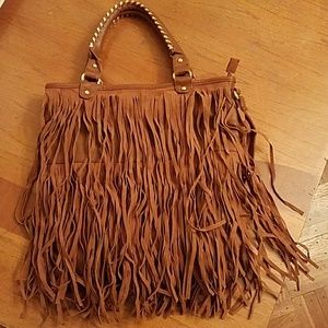Brown fringe statement purse