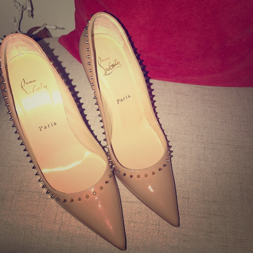 SOLD!!! Louboutin pointy heels with studs