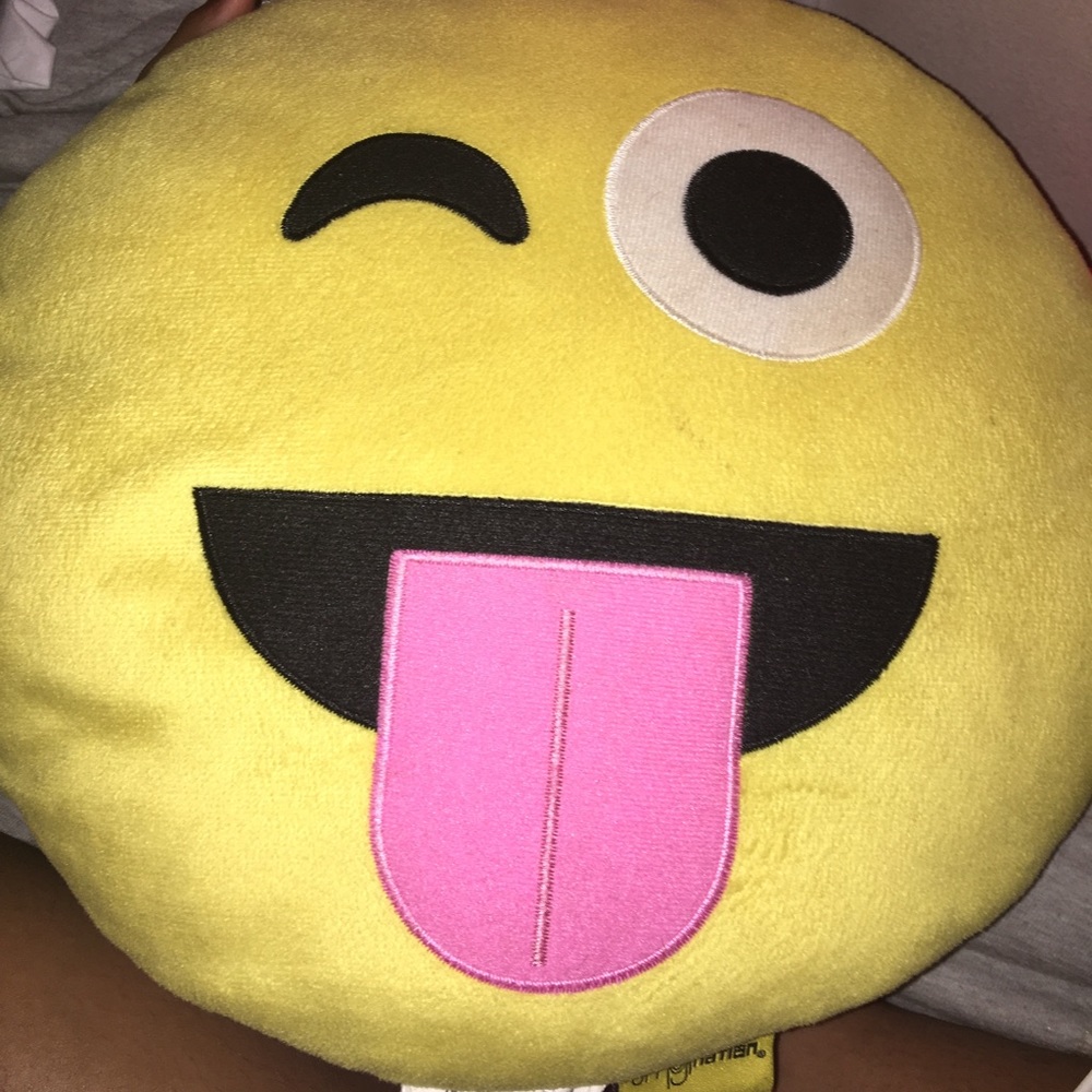 two emoji pillows