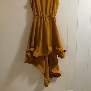 Mustard colored high-low ruffled dress