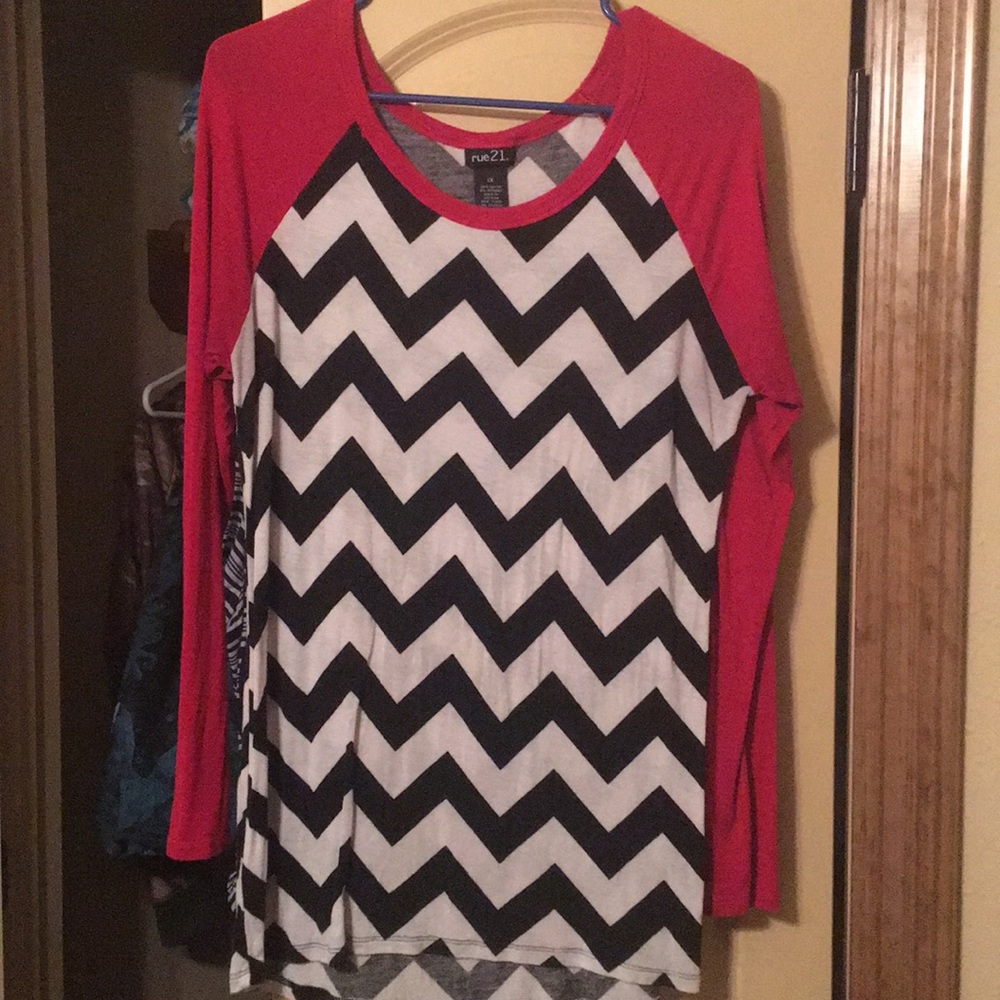 woman’s chevron and red long sleeve shirt
