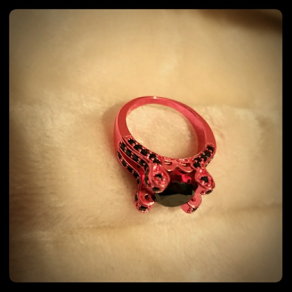 Pink and black ring