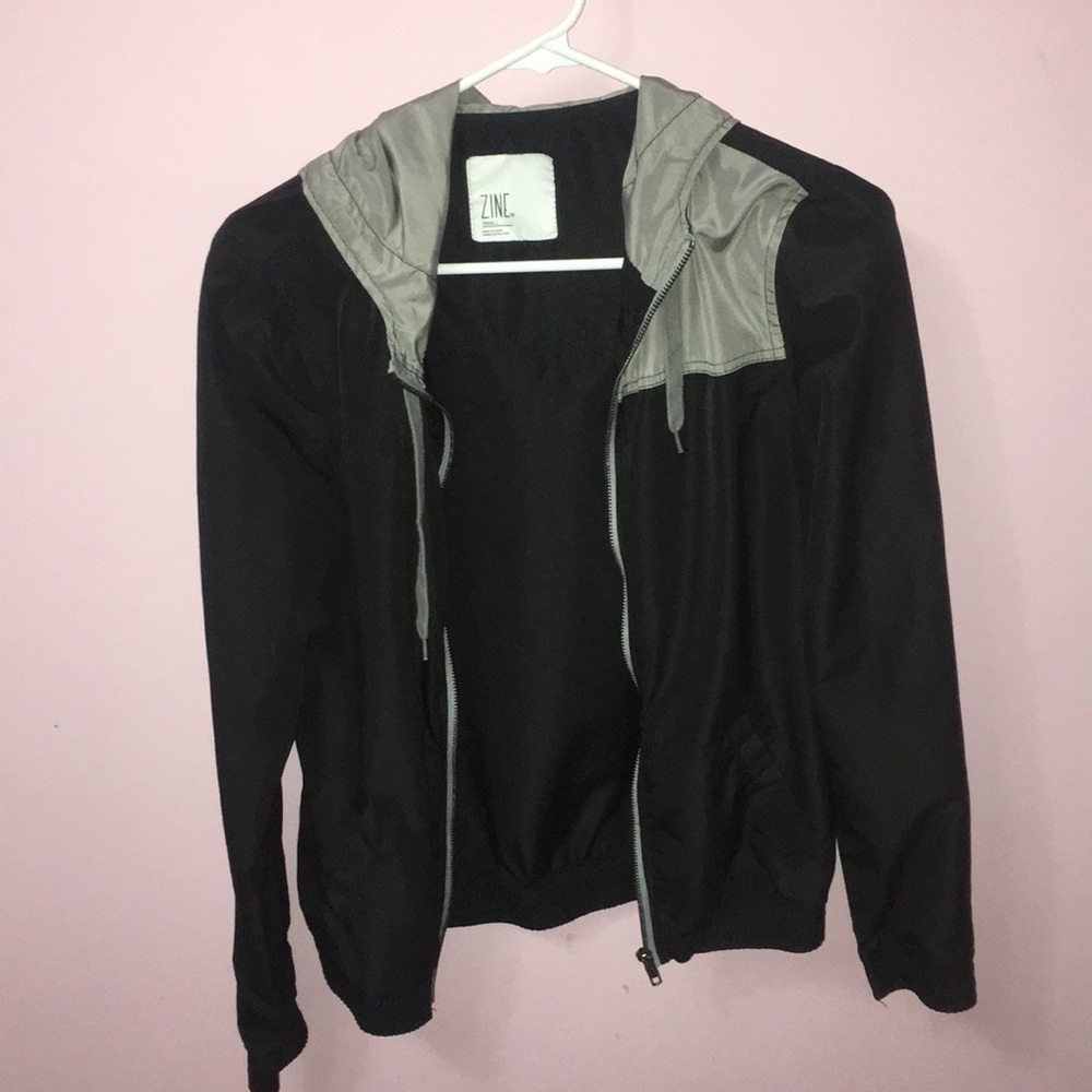 Black and grey windbreaker