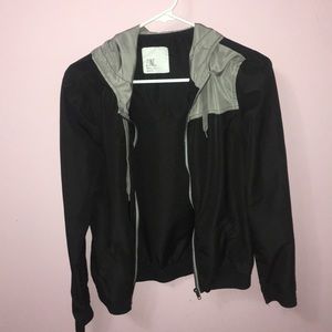 Black and grey windbreaker