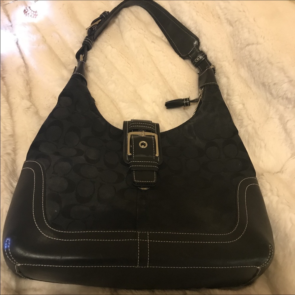 Black coach purse with pattern
