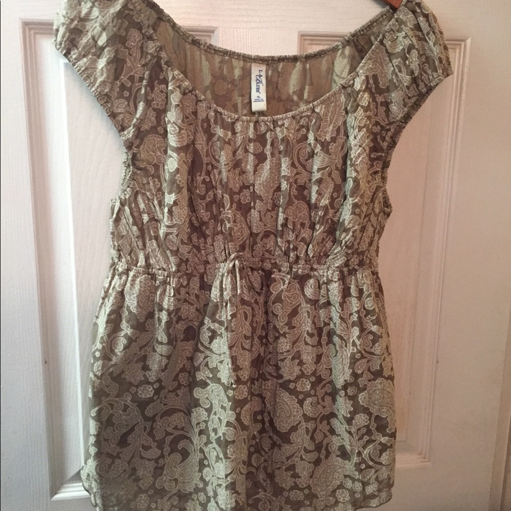 Sleeveless, empire waist blouse
