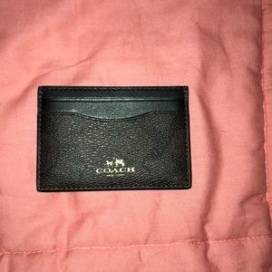 Coach card case in signature.